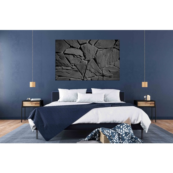 Charcoal black decorative uneven cracked real stone wall